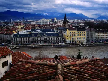 Riverside City Under Mountains wallpaper