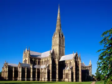 Gothic Spire Under Clear Skies wallpaper