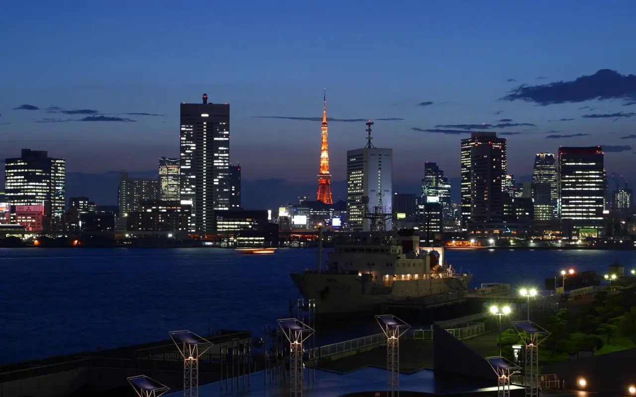Twilight Skyline over Tokyo Bay – blue and black desktop wallpaper, 1680×1050