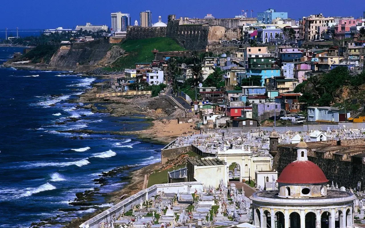 Coastal Fortress And City View – blue and purple desktop wallpaper, 1680×1050
