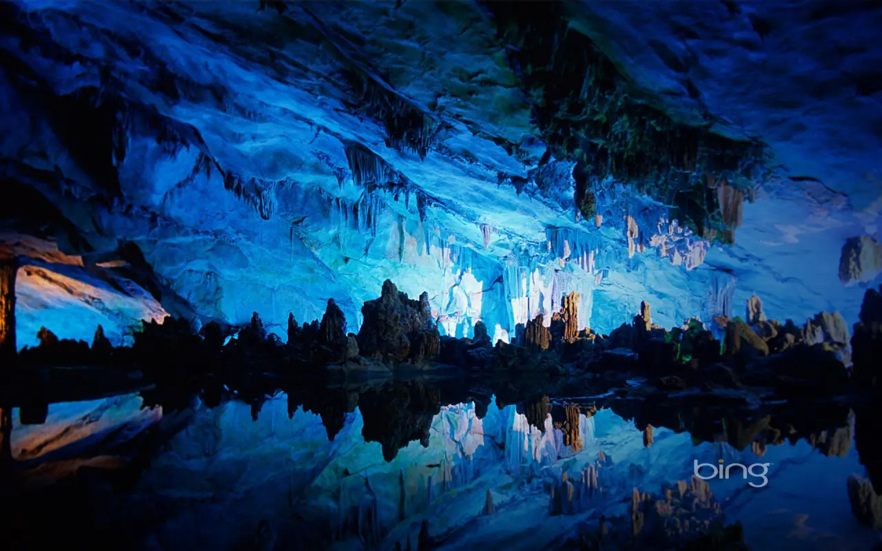Glow of the Blue Cavern – black and blue desktop wallpaper, 1920×1200