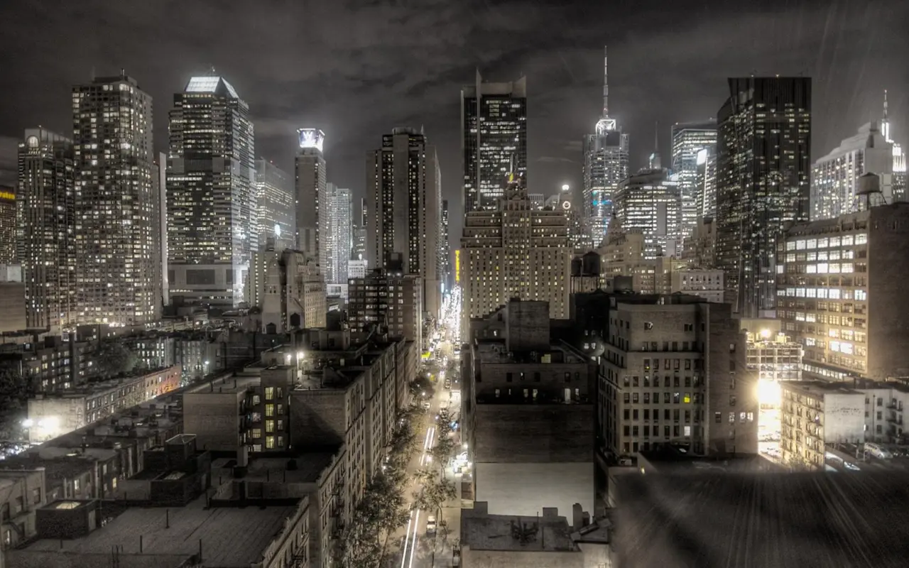 Midnight City Skyline Glow – black and grey desktop wallpaper, 1680×1050
