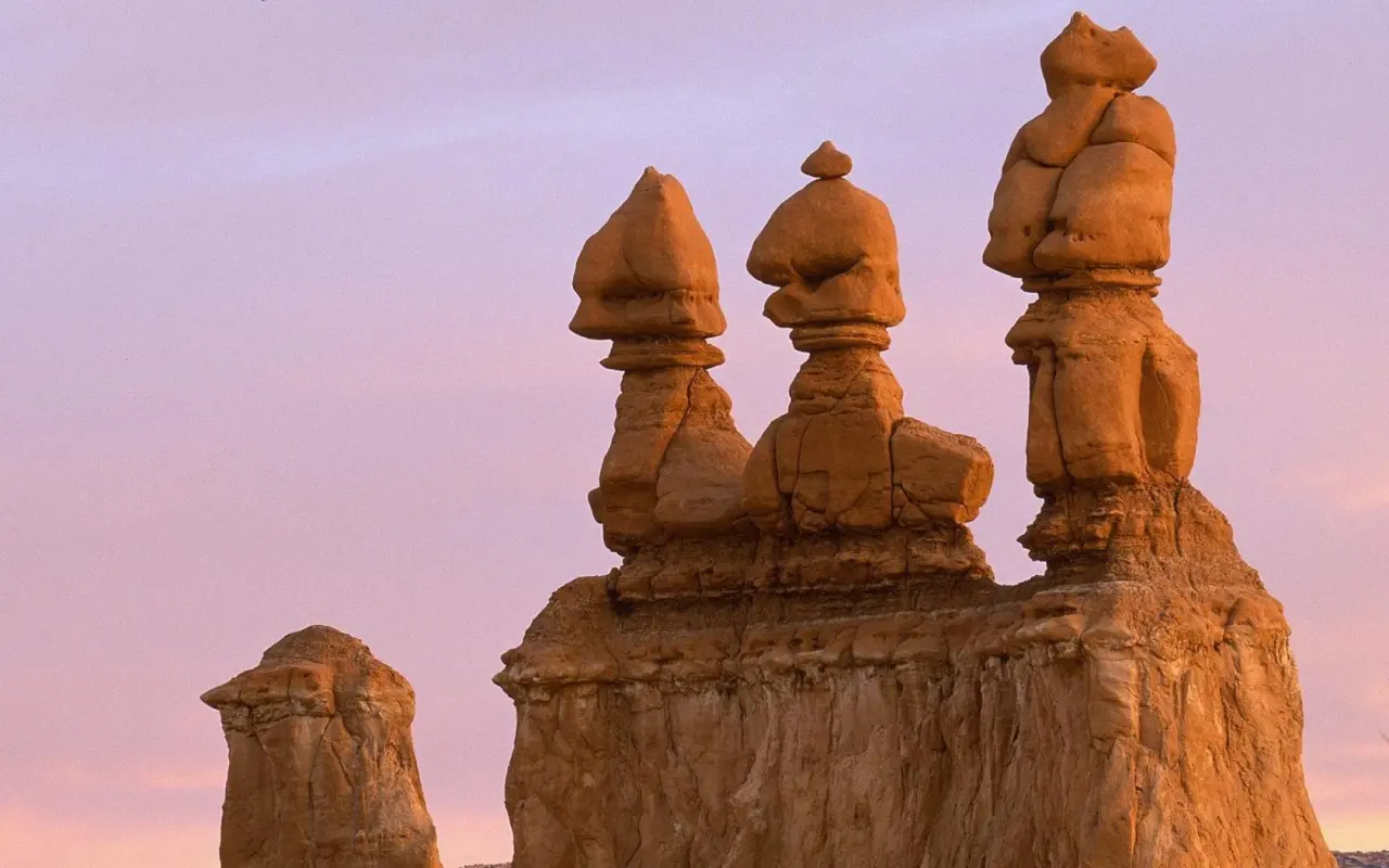 Desert Hoodoo Silhouettes At Dusk – brown and purple desktop wallpaper, 1680×1050