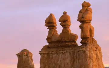 Desert Hoodoo Silhouettes At Dusk wallpaper