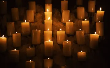 Glow Of Many Candles wallpaper