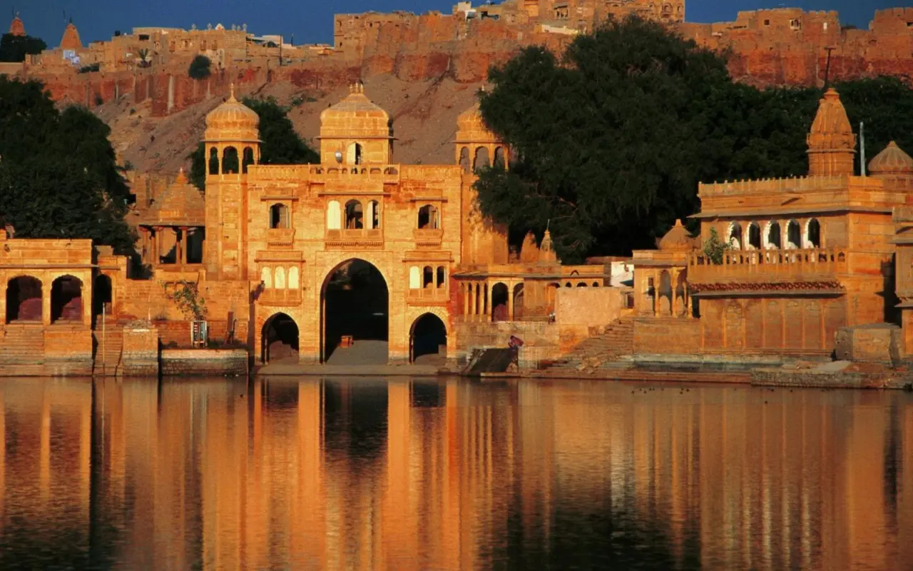 Golden Fortress By The Water – brown and black desktop wallpaper, 1680×1050