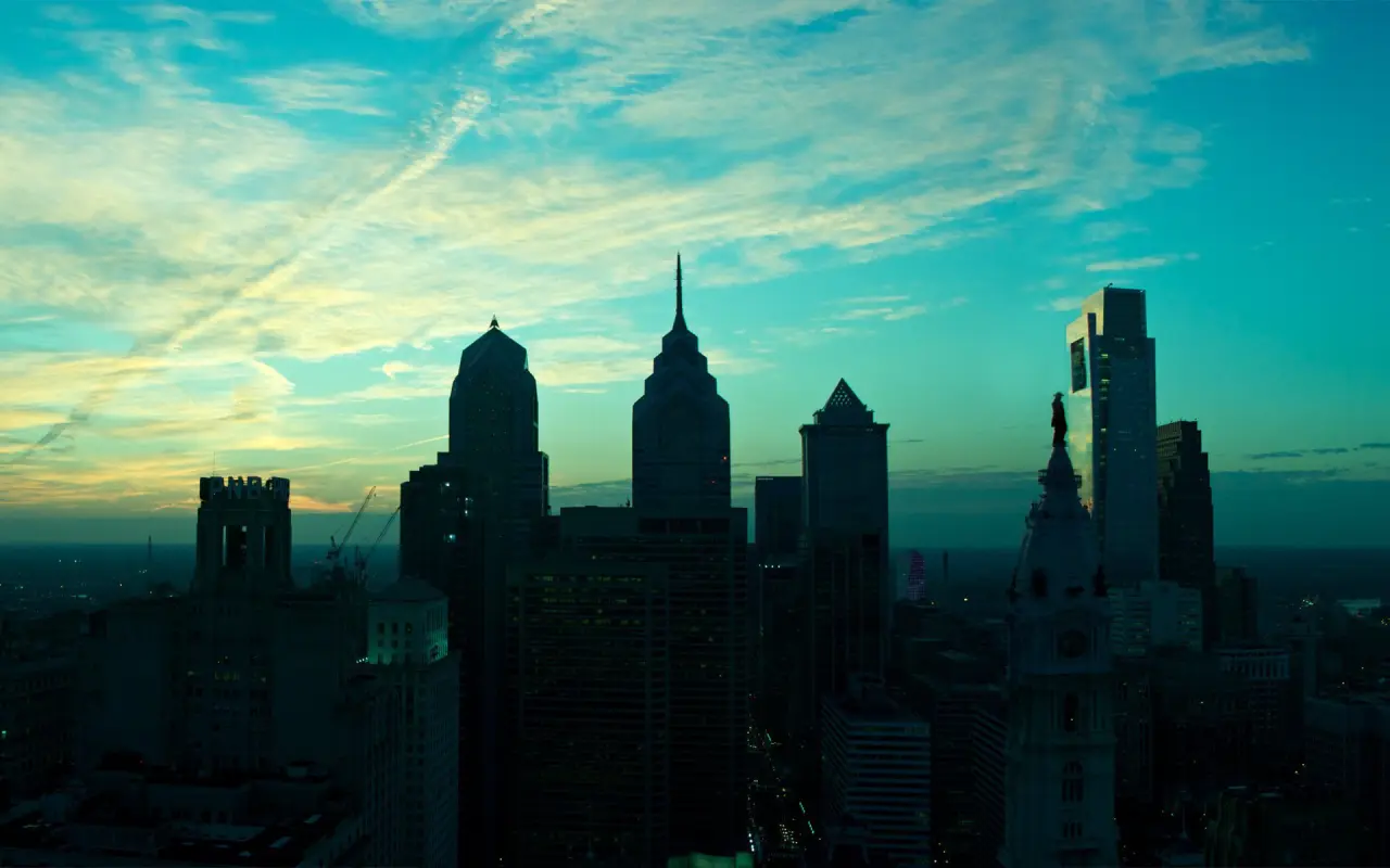 Cyan City Skyline at Dusk – black and teal desktop wallpaper, 1920×1200