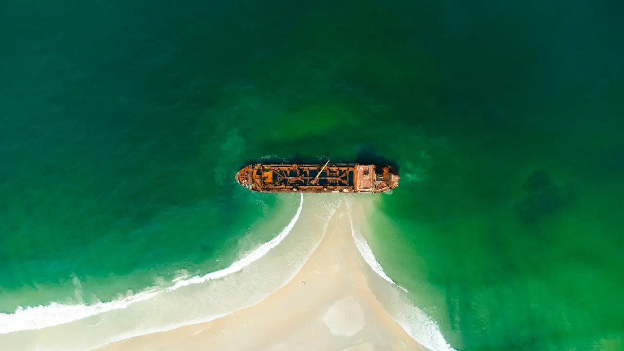 Shipwreck On Sandy Shore – teal and green desktop wallpaper, 4000×2250