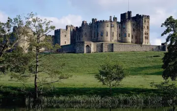 Ancient Stone Castle on Green Hill wallpaper