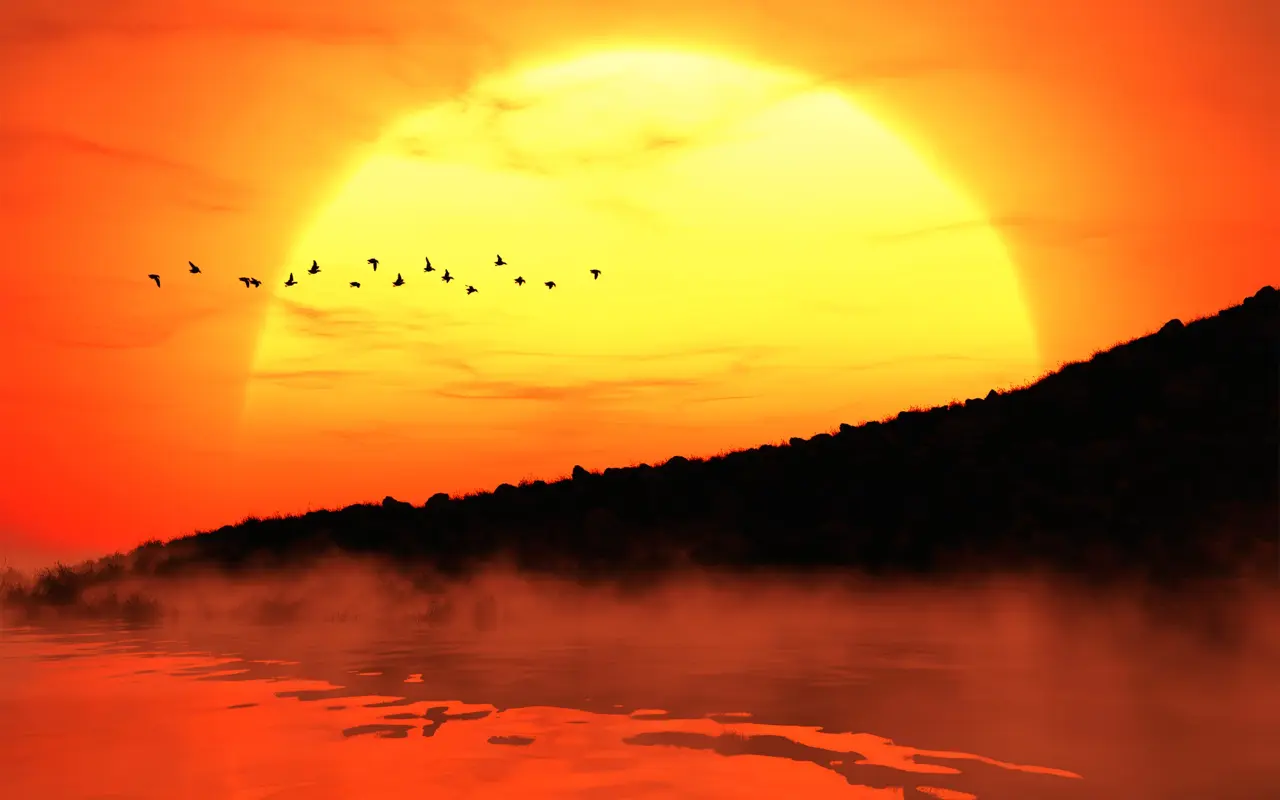 Flight Across the Golden Sun – orange and red desktop wallpaper, 2560×1600