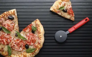Freshly Sliced Pizza wallpaper